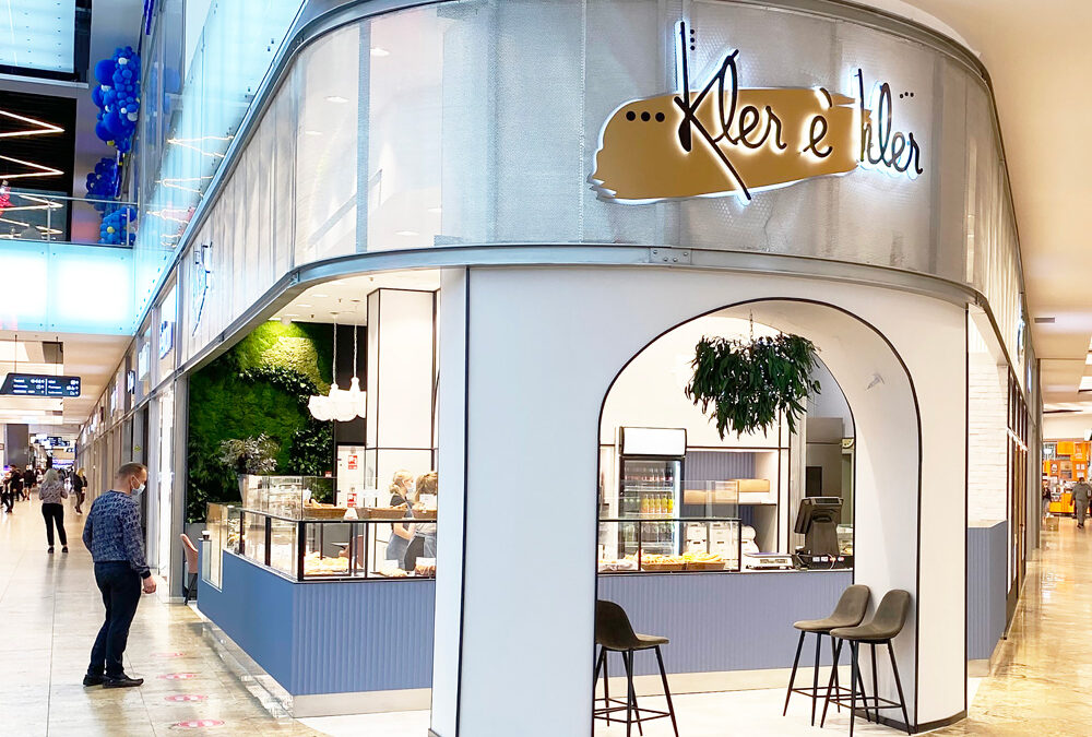 Multi-panel installation integrated into the bakery customer space created in a shopping mall area